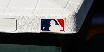 SCOTTSDALE, AZ - FEBRUARY 22: The MLB logo on a base before the MLB Spring Training baseball game between the Arizona Diamondbacks and the Colorado Rockies on February 22, 2025 at Salt River Fields at Talking Stick in Scottsdale, Arizona. (Photo by Kevin Abele/Icon Sportswire)